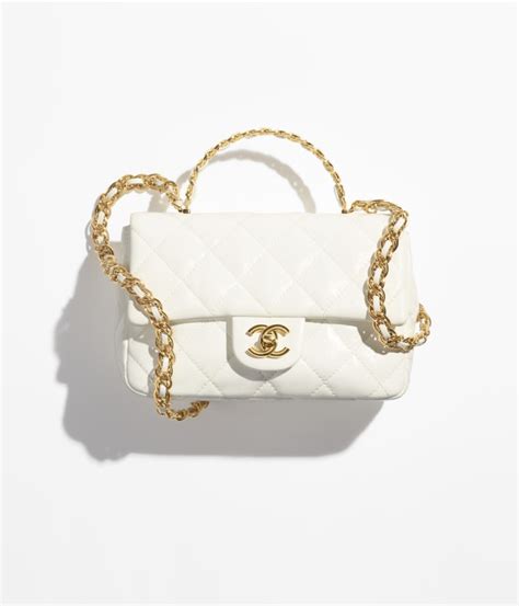 chanel n4858|Mini bag with top handle, Shiny lambskin & gold.